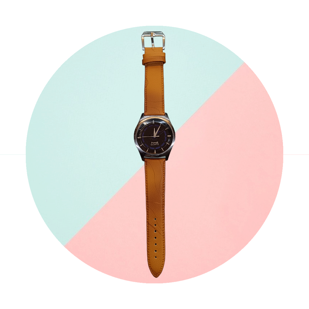 "Vintage Chic: Black Round Dial HMT Watch with Tan Leather Strap"