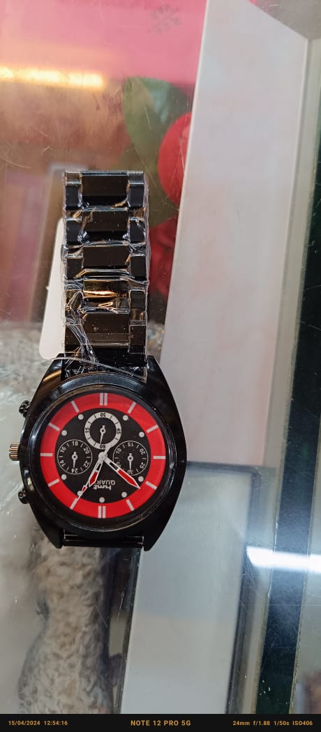 "HMT Quartz Chain Watch: Sleek Black Edition"