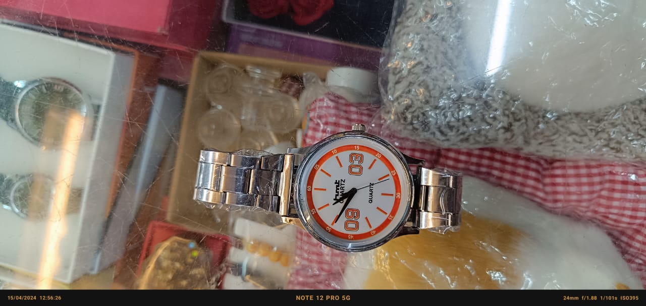 : "Timeless Precision: HMT Quartz Silver Metal Watch"